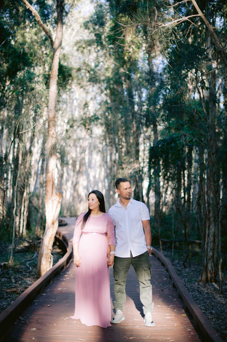 Young Couple Walking In A Park