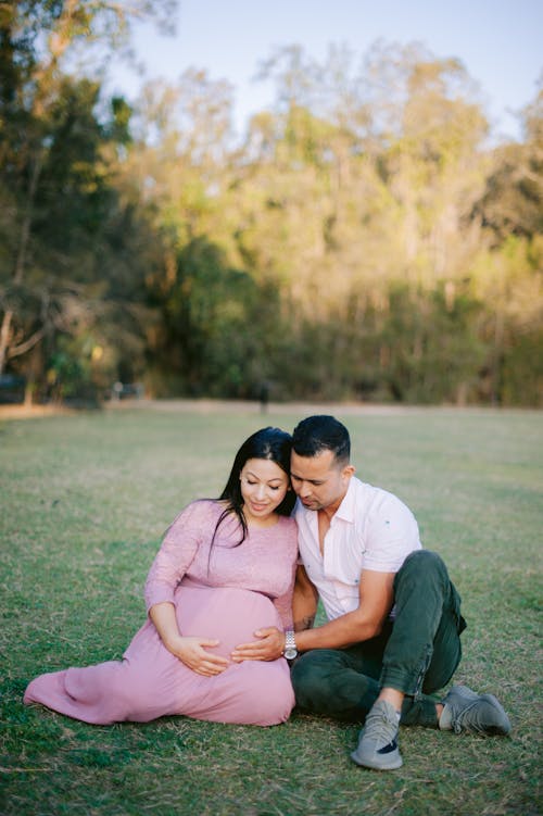 Expecting Woman with Man in Park