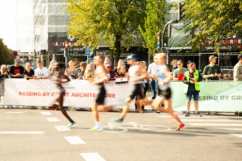 Group of Runners at Competition in City