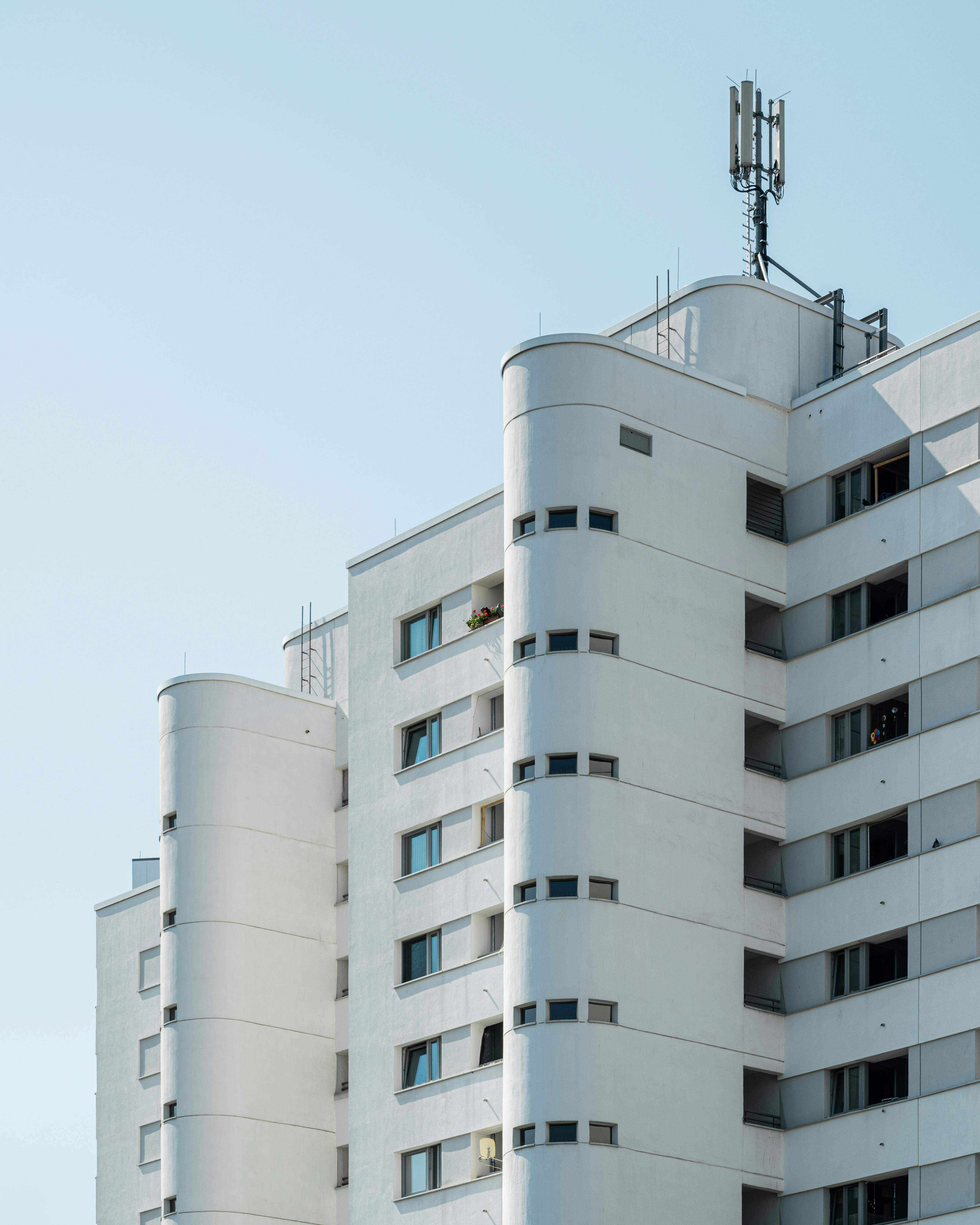 Abstract view of a modern Berlin Plattenbau with clean lines and clear sky.