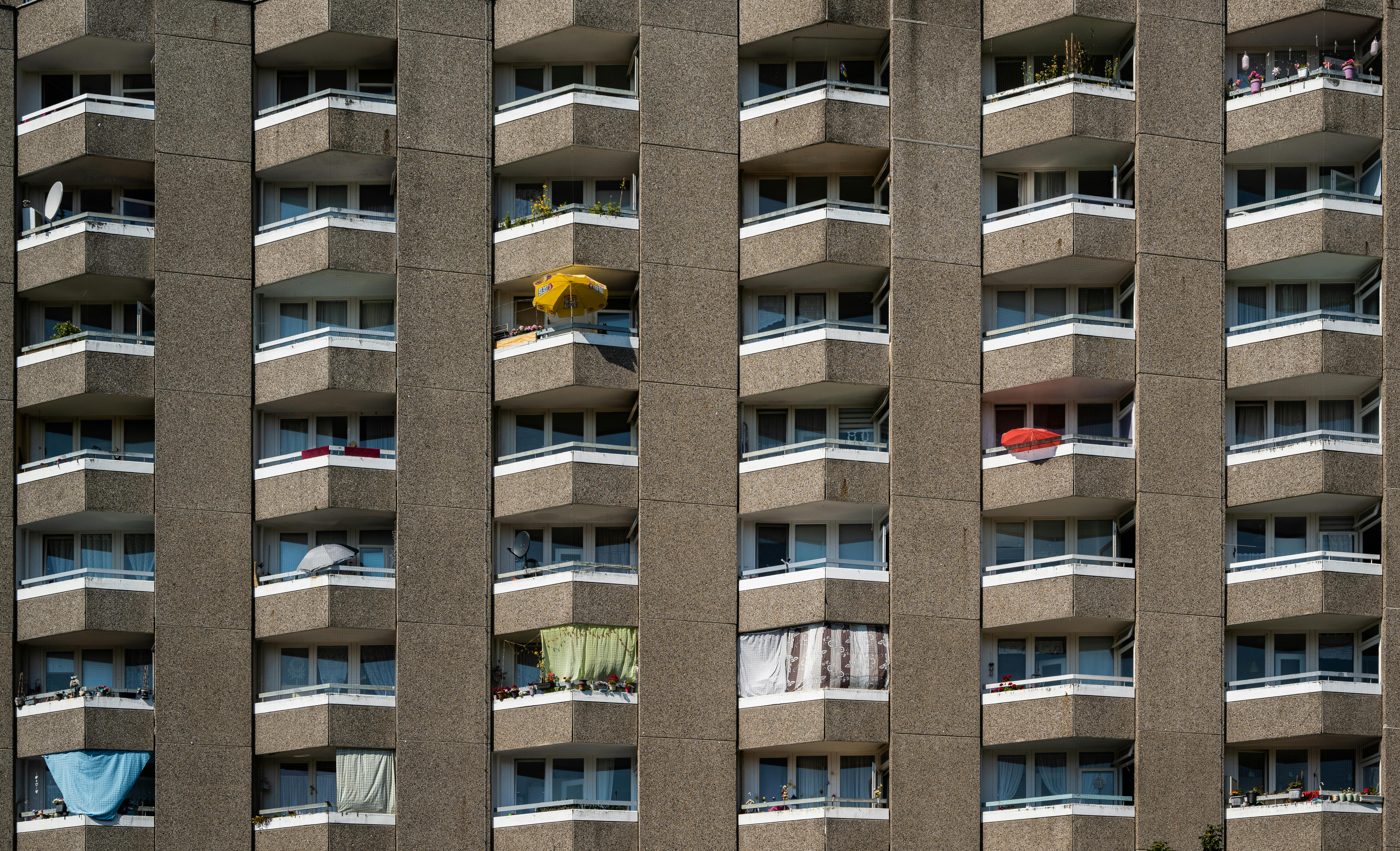 a building with many balconies and windows