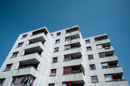 An apartment building with balconies and windows