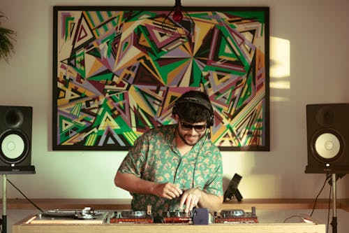 A DJ Using a Console 