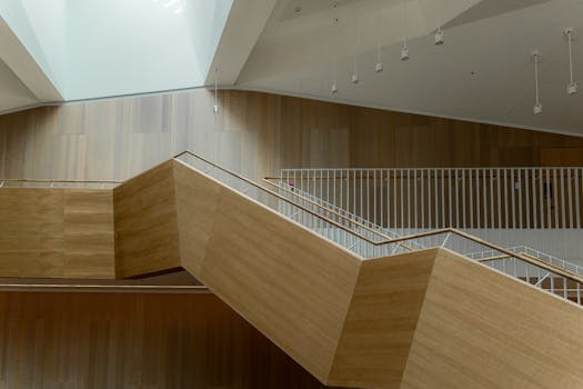 Contemporary wooden stairs in a modern interior at Ventspils, Latvia.