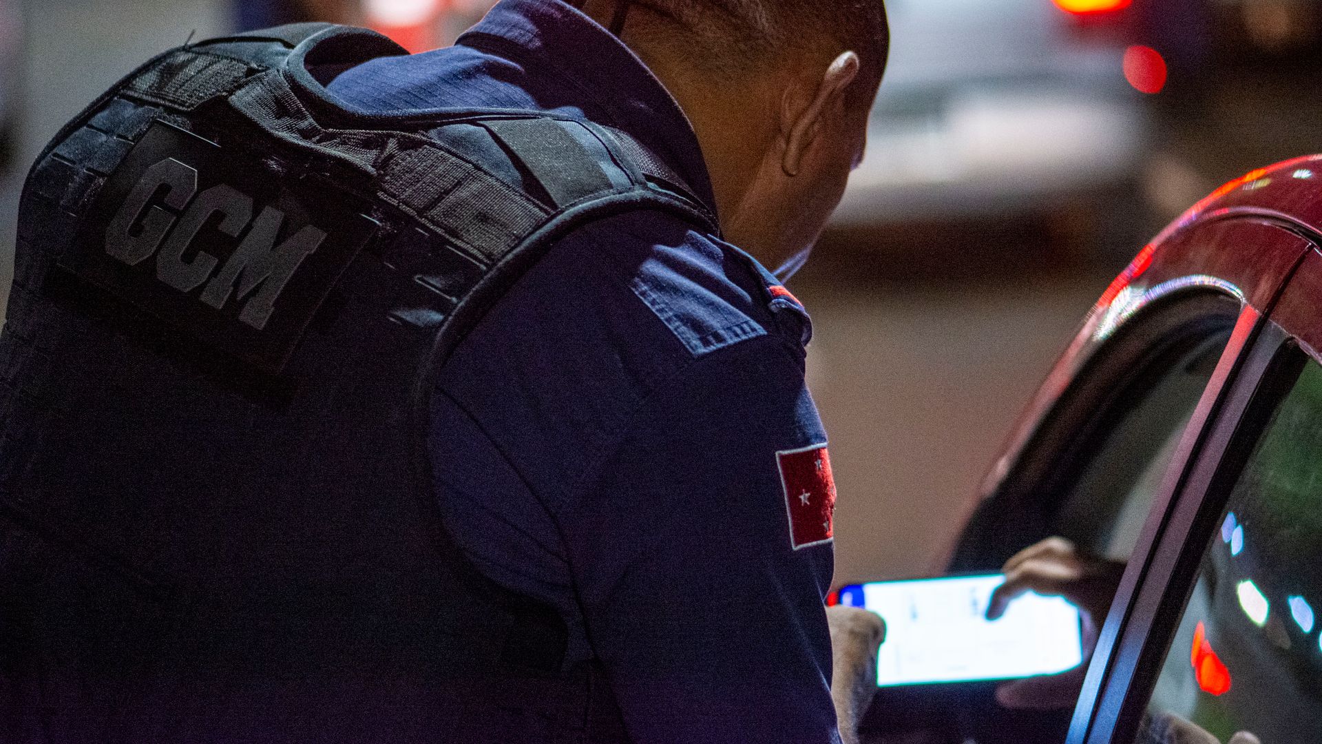 Modafinil Customs Regulations: Understanding the Legal Landscape A GCM officer checks documents during night traffic control in Londrina, Brazil — modafinil customs regulations