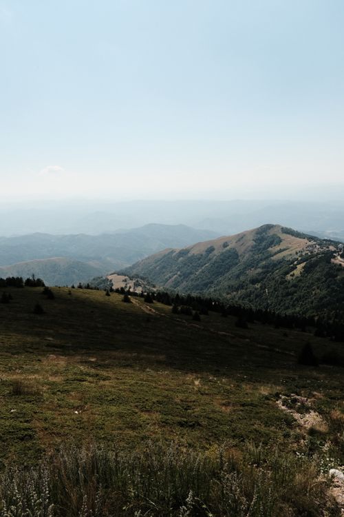 Free Explore the breathtaking mountain views and lush greenery of Kopaonik, Serbia, captured in vibrant daylight. Stock Photo