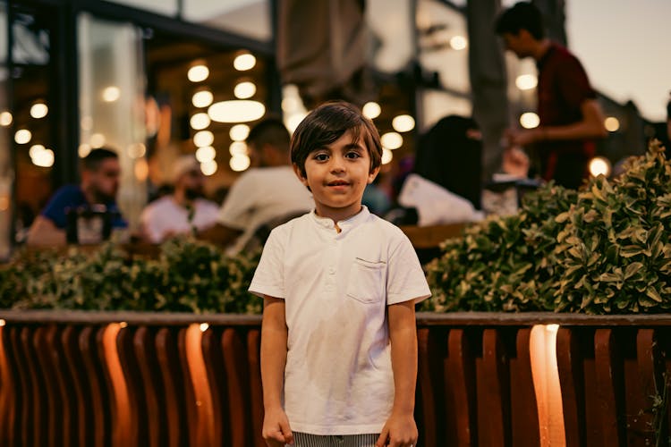 Photo Of A Boy With A Stain On His Shirt 