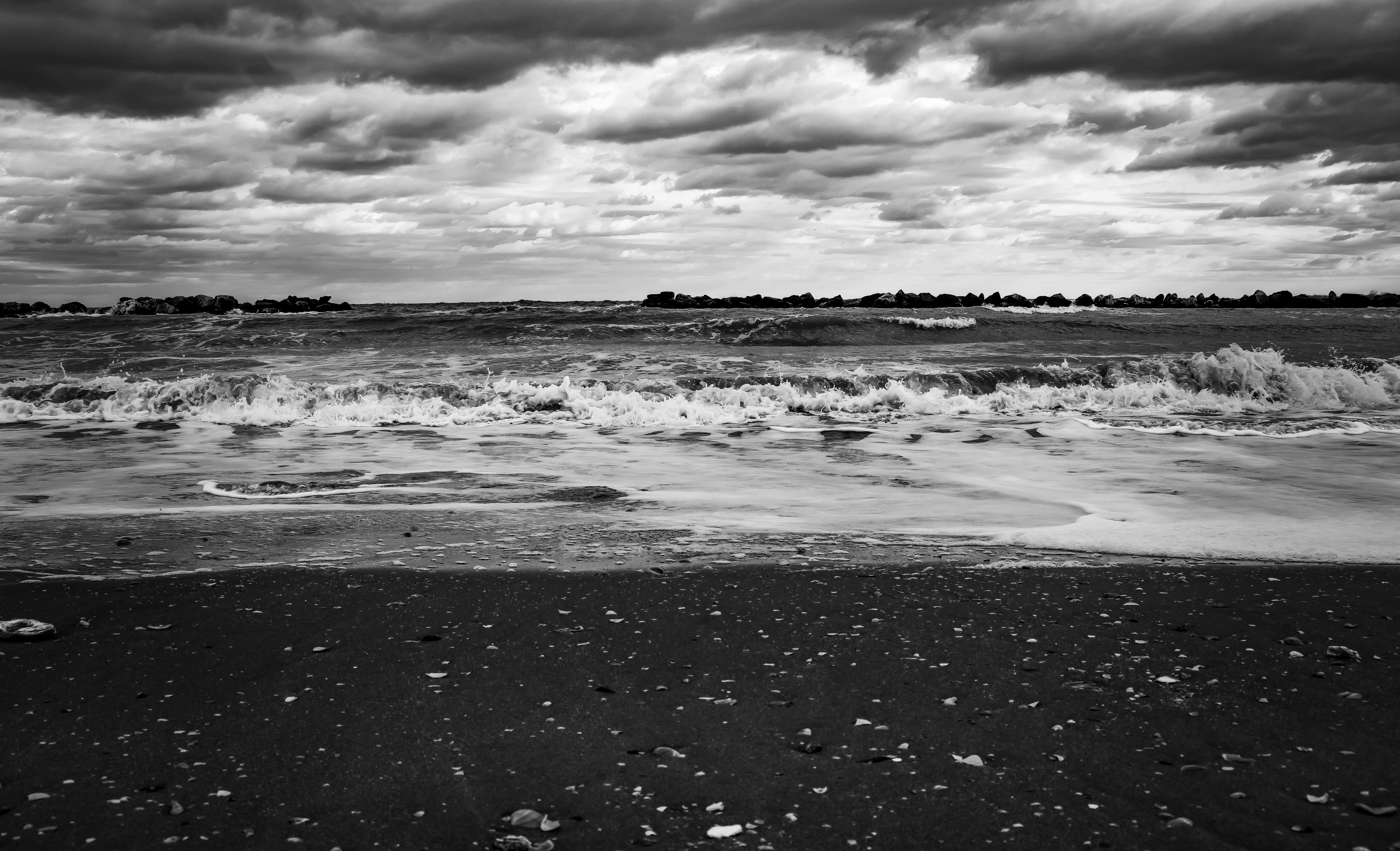 Black and White Photo of Waves Crashing onto Sea Shore · Free Stock Photo