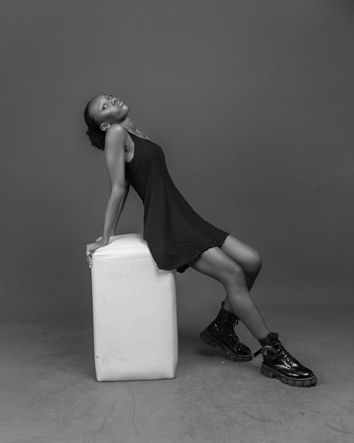 Woman Posing in Dress in Black and White