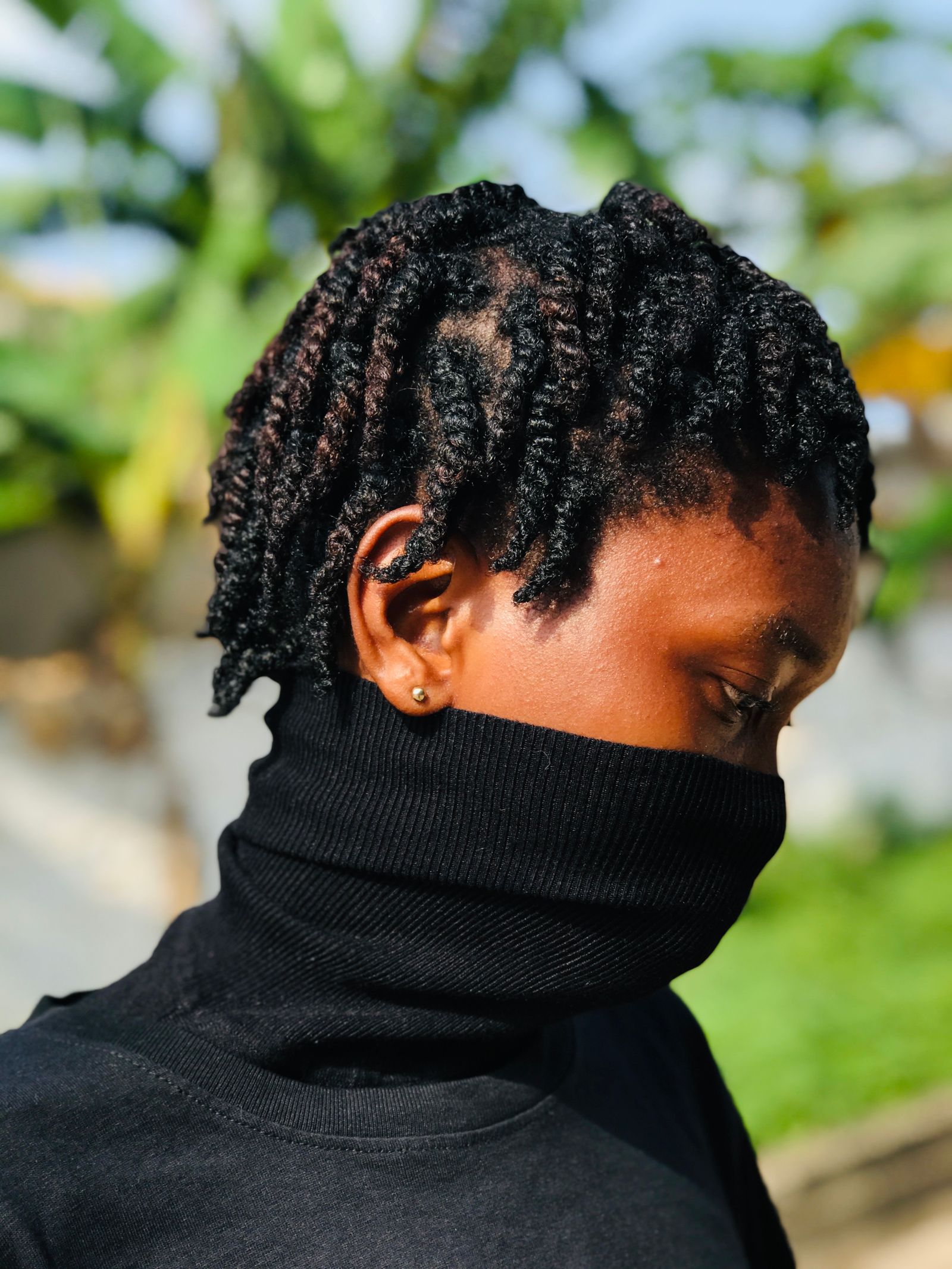 Twisted protective hairstyle side profile