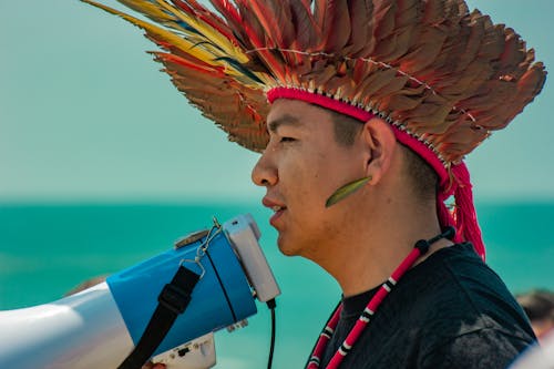 Man in Traditional Plume and with Megaphone