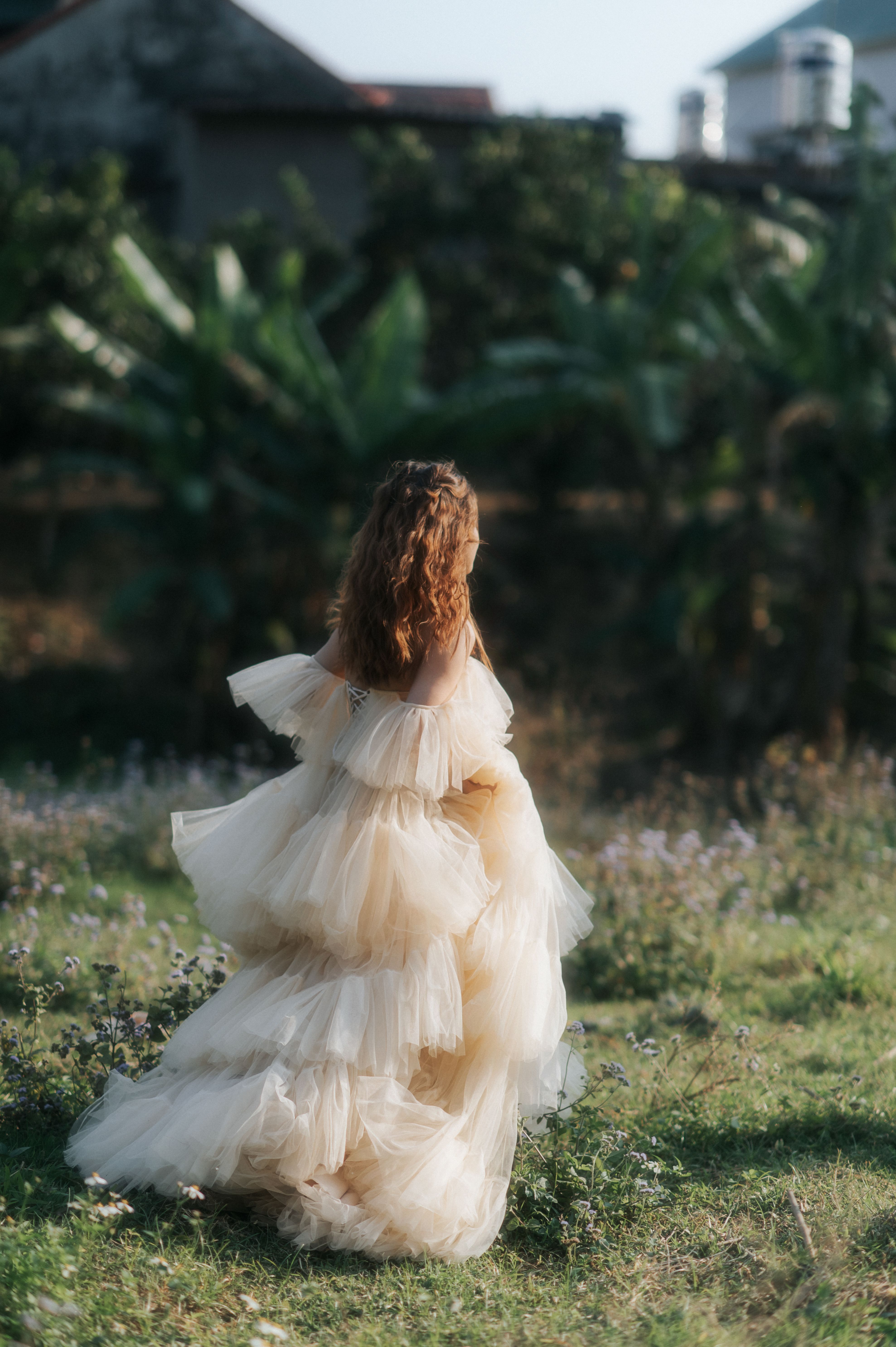Woman in Chiffon Dress with Ruffles · Free Stock Photo