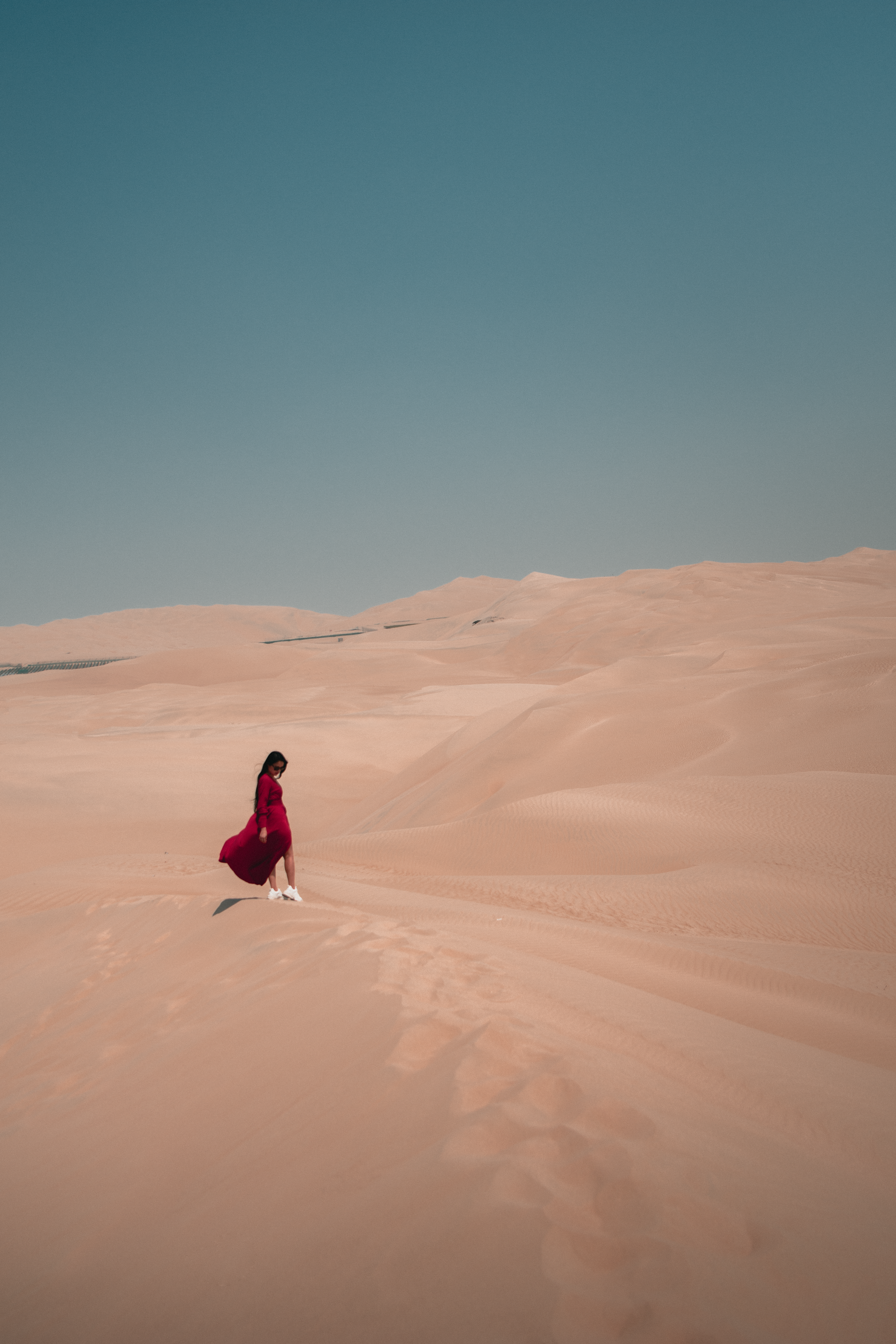 Woman in Red Dress in Desert  Free Stock Photo