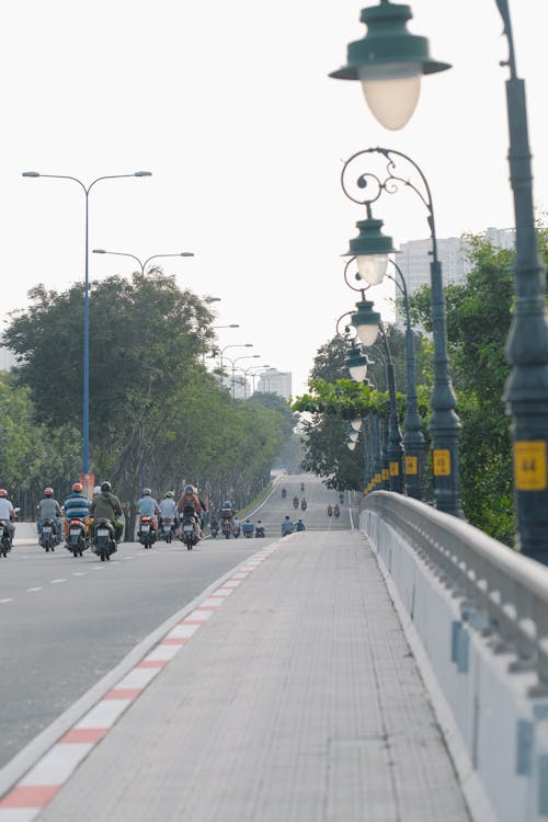 Motor Scooters on the Bridge