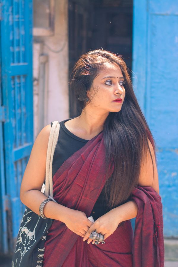 Young Indian woman in custom-tailored ethnic wear