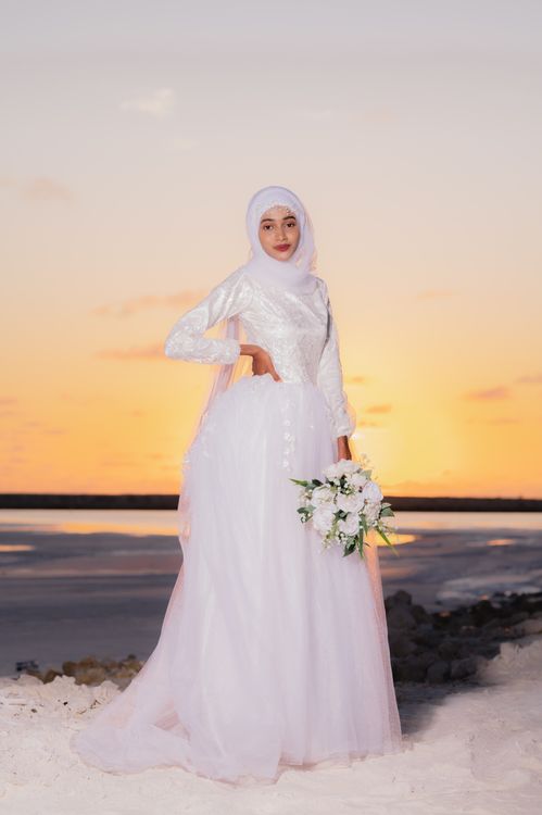 white hijab dress Samra Satin in Hijabglamour The dress includes subtle details like delicate pleats Hijabi Woman in White Wedding