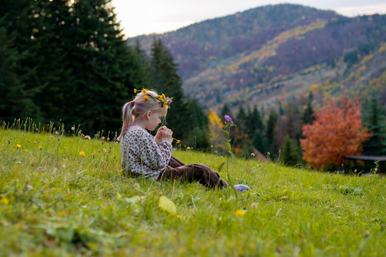 Girl On Mountain Meadow In Autumn