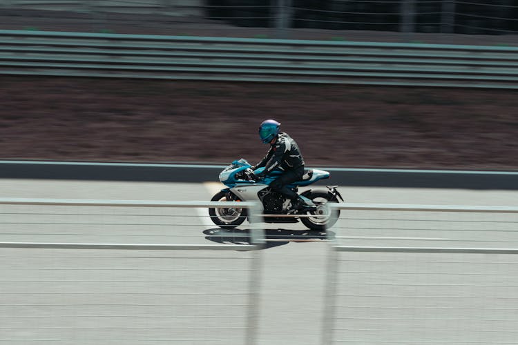 Motorcycle Rider On Racing Circuit