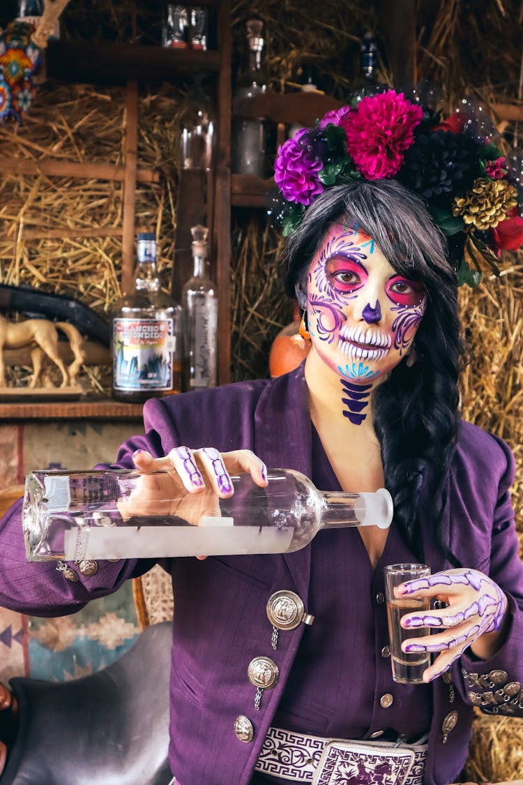 Catrina Pouring Tequila