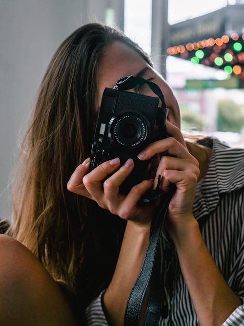 Photo of Woman Taking Picture