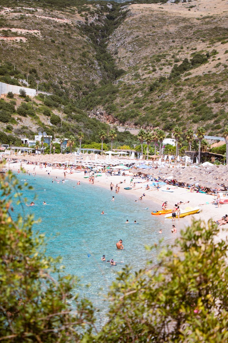 People On Beach On Sea Coast