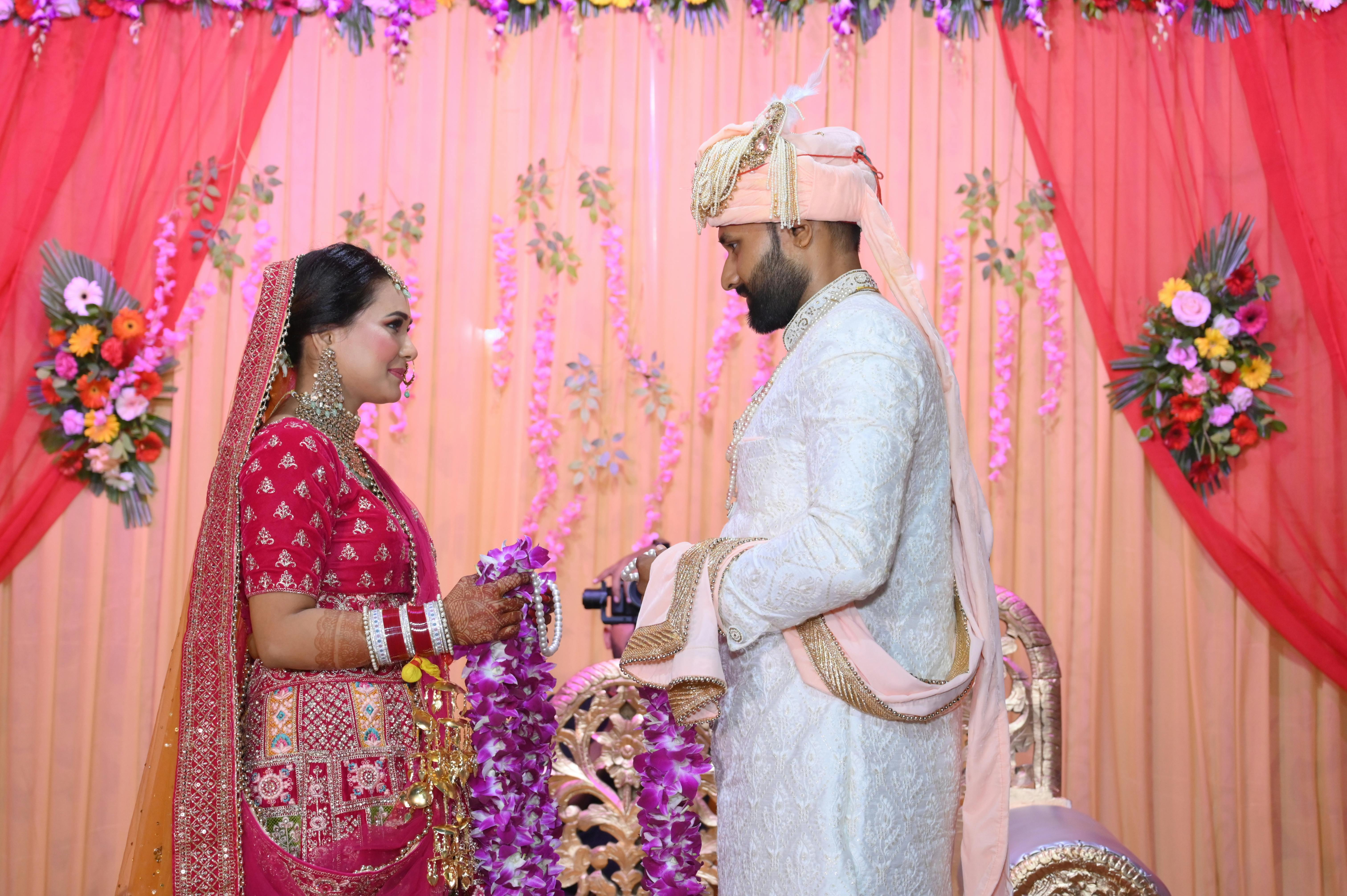Couple in Traditional Wedding Costumes · Free Stock Photo