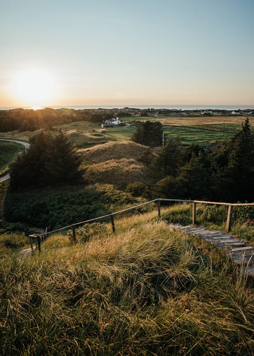 Fotos de stock gratuitas de escaleras, puesta de sol, rural