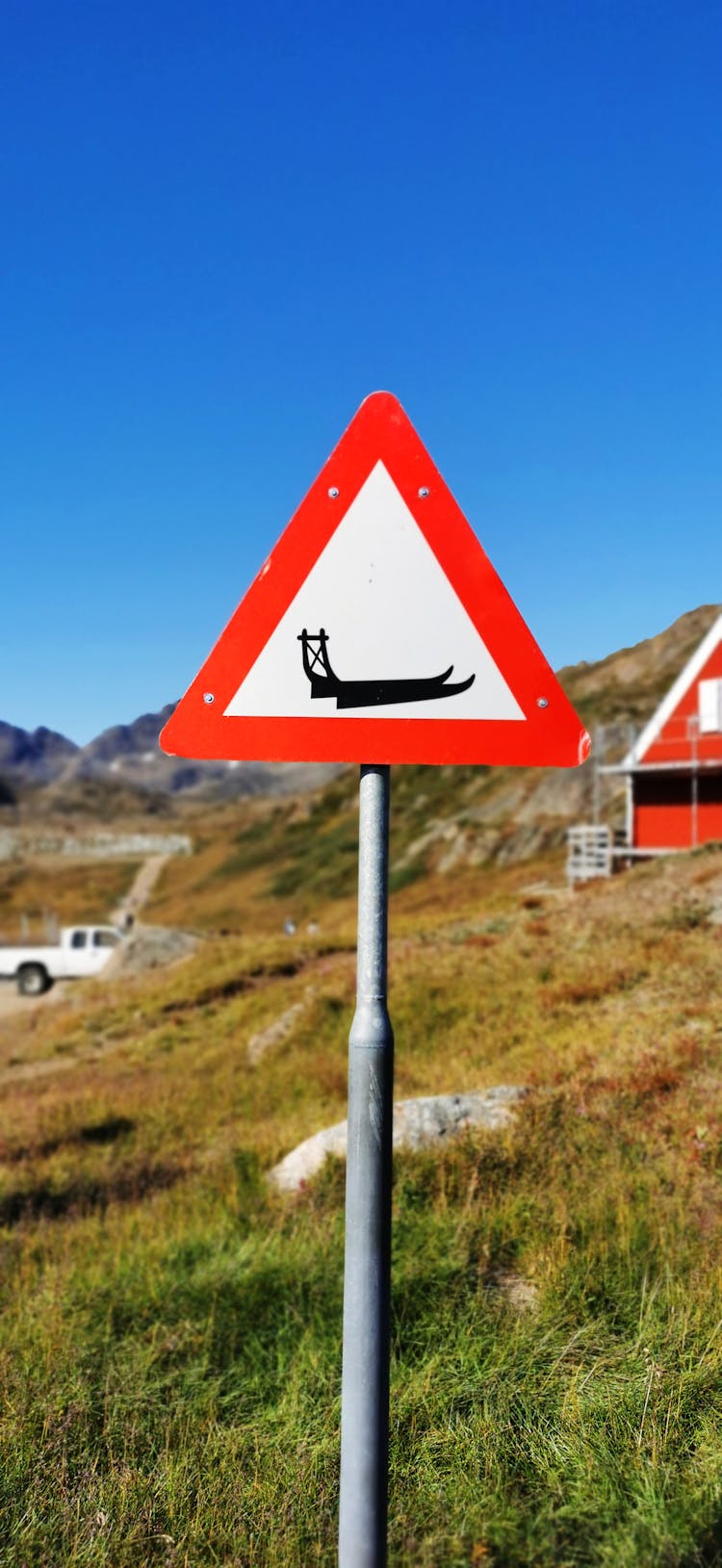 Mountain Landscape With Sledge Road Sign