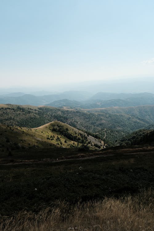 A view of the mountains and hills from a hill