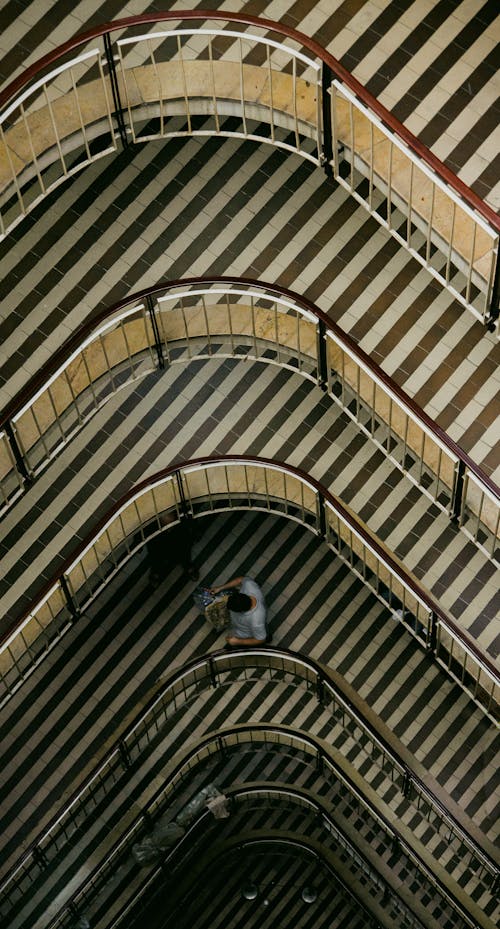 High Angle View of a Modernist Structure with Striped Balconies