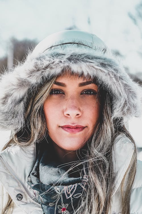 Portrait of a Cute Woman in a Hood