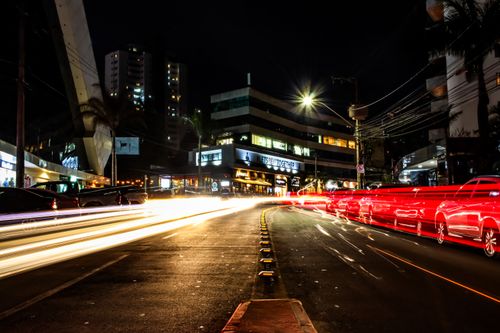 Free Vibrant light trails on a busy night street in Belo Horizonte, Brazil, showcasing urban energy. Stock Photo