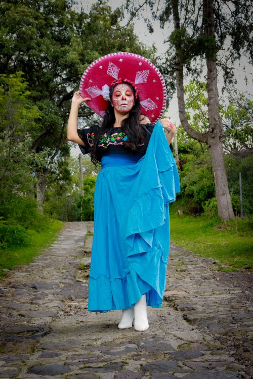 Free Woman dressed as Santa Muerte with makeup and sombrero in San Salvador Cuauhtenco. Stock Photo