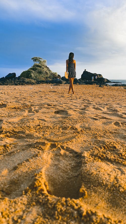 Woman walking in beach