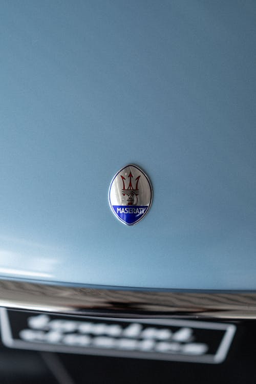 Close-up of the Emblem on the Hood of a Maserati 