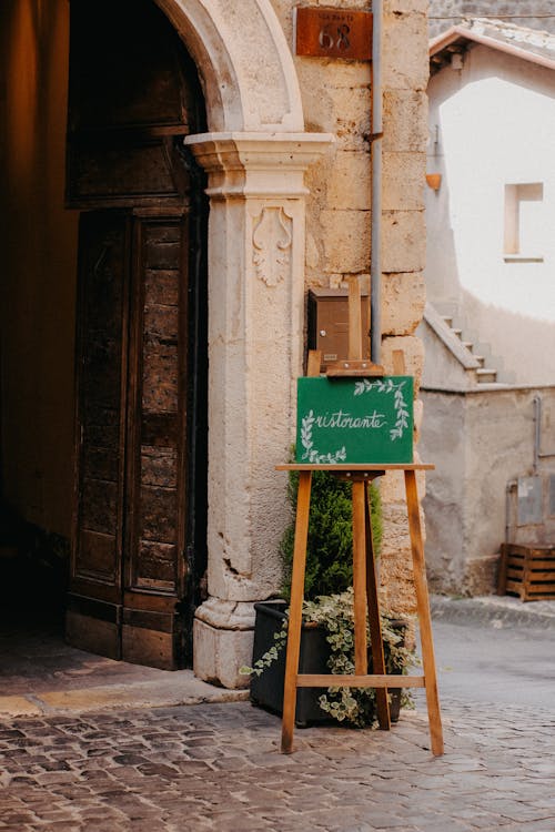 Stand on Cobblestone Pavement in Old Town