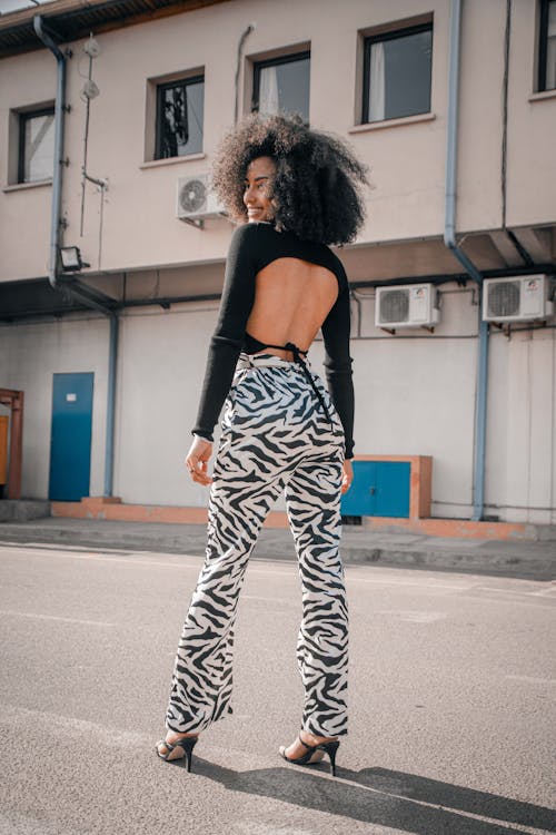 Smiling Woman with Curly Hair