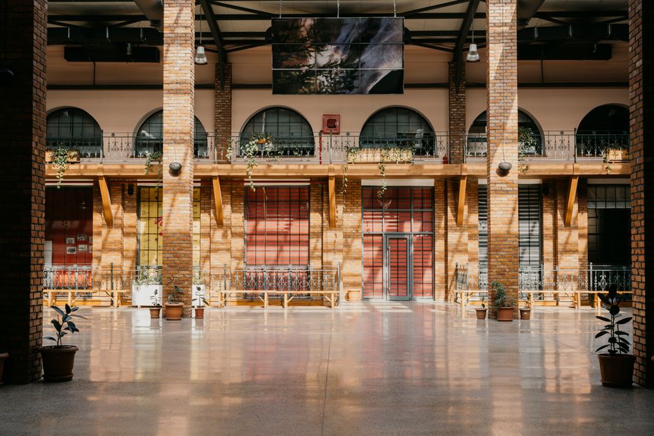 Spacious interior showcasing modern brick architecture with natural lighting in Baku, Azerbaijan.