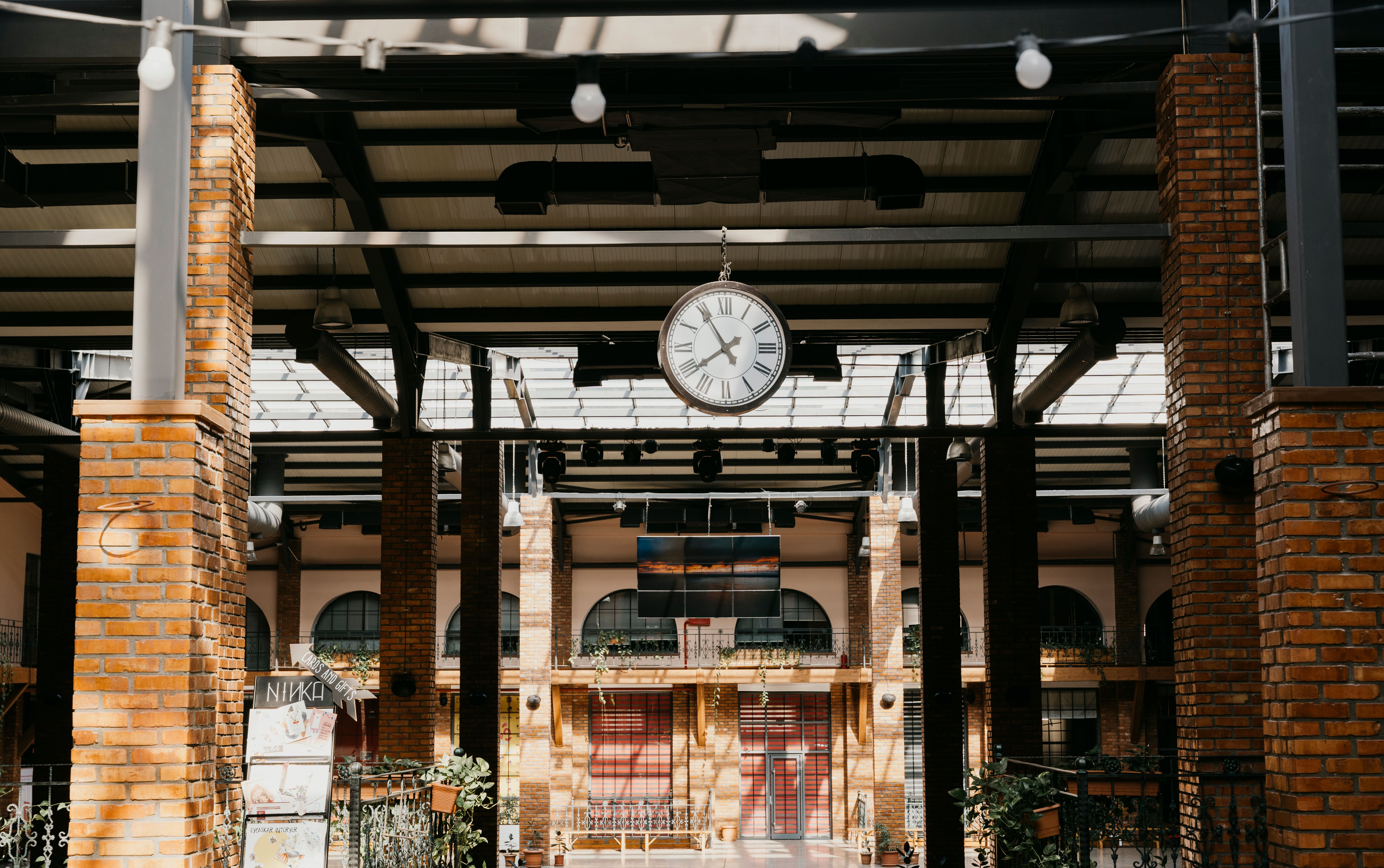 A Clock in a Building · Free Stock Photo