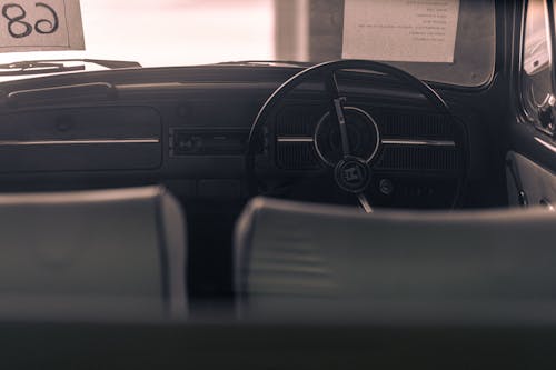 A car with a steering wheel and a dashboard