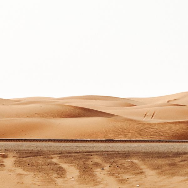 Sand dunes under a pale sky, photo by aboodi vesakaran on Pexels