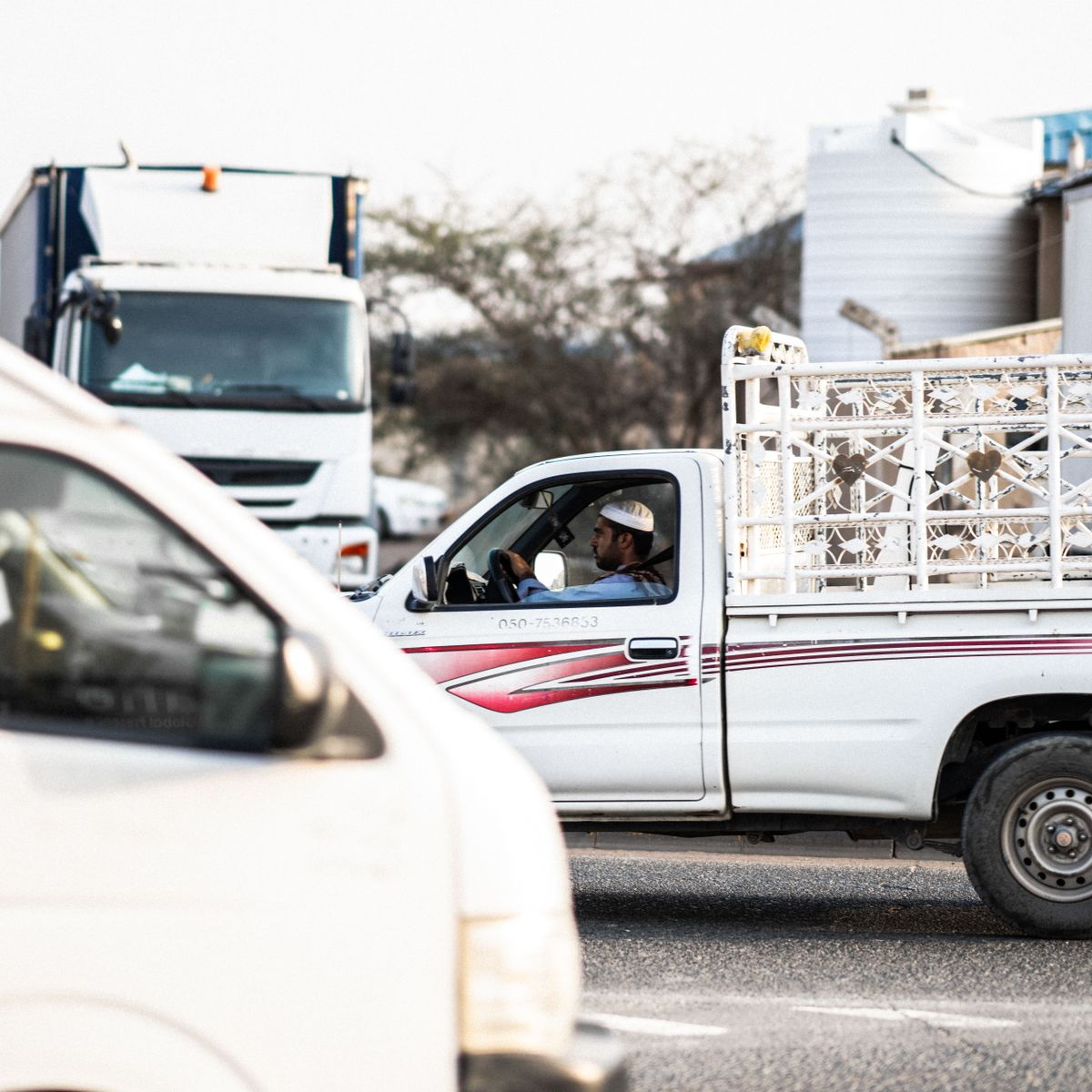 Pickup truck in urban traffic