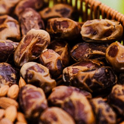 Fresh dates and almonds in a basket, photo by aboodi vesakaran on Pexels