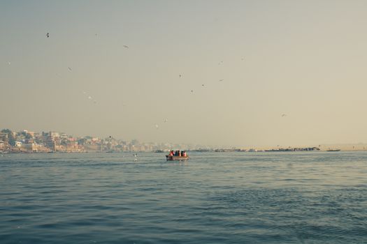 Dawn Ganges boat with a priest — Varanasi