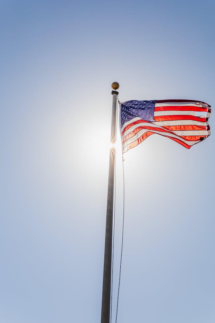 USA Flag Flying On A Mast