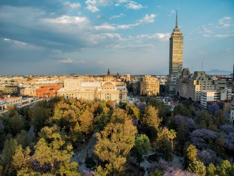 Stunning aerial view of Mexico City's skyline featuring the Palacio de Bellas Artes and Torre Latinoamericana.