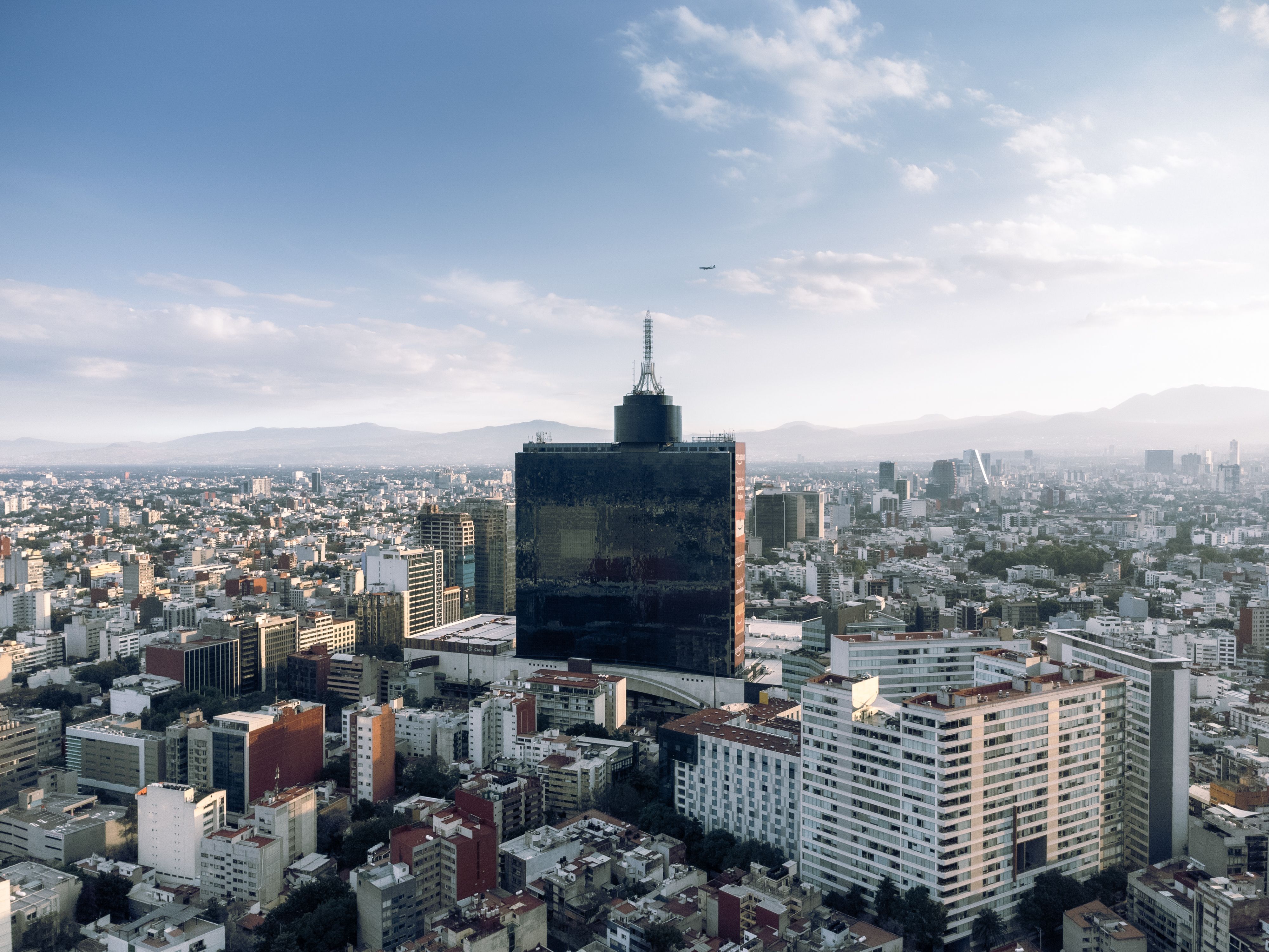 Panorama of Mexico City at twilight with the World Trade Center Mexico tower and dense urban neighborhoods