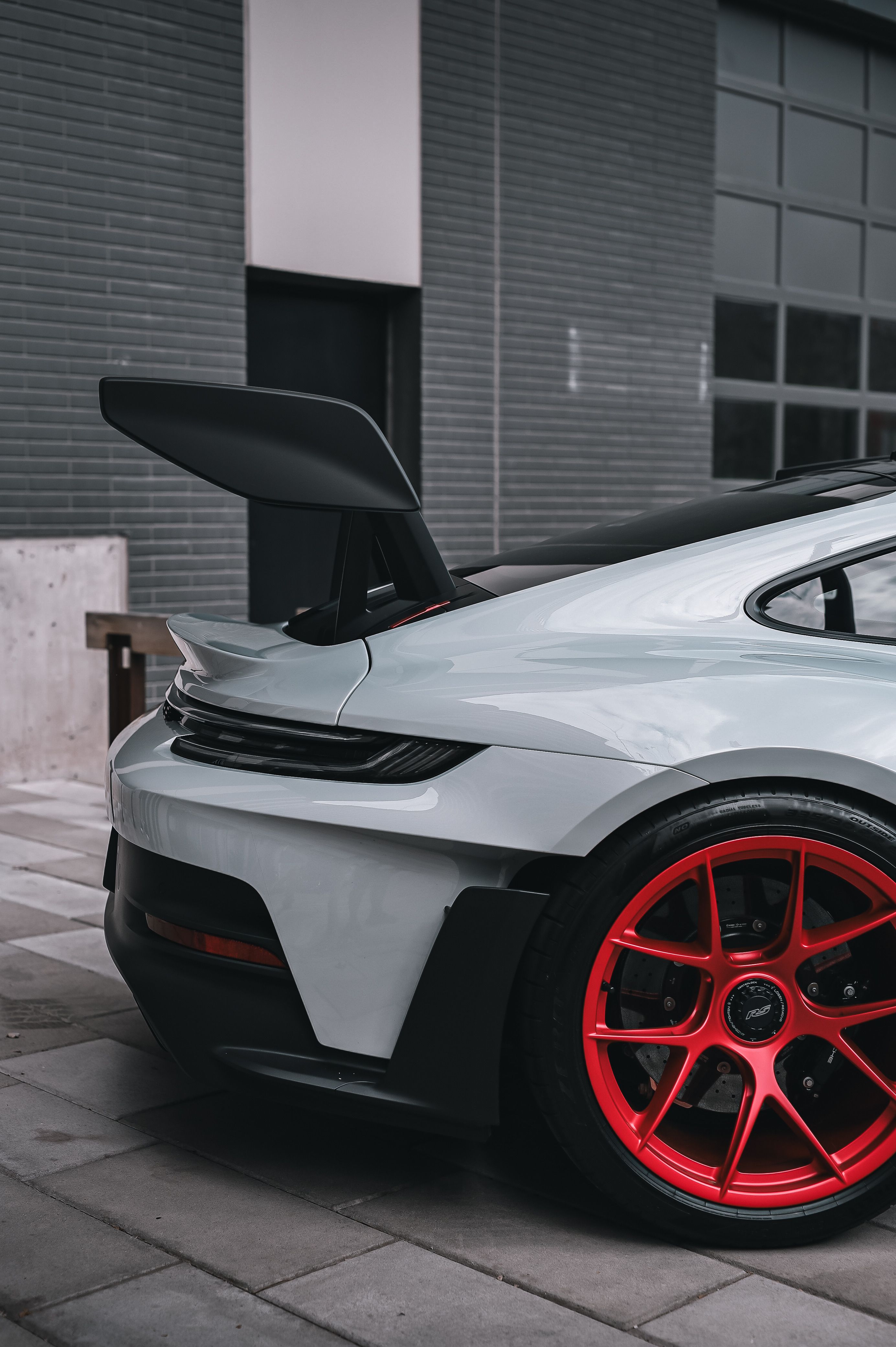 Sleek Modern Sports Car with Golden Rims · Free Stock Photo