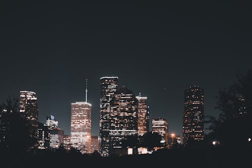 Free Illuminated Skyscrapers on Night Sky Stock Photo