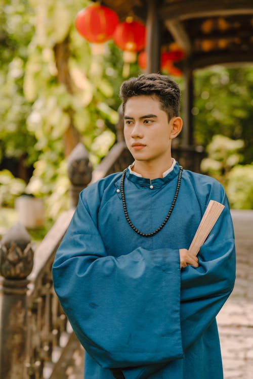 Man in Blue, Traditional Robes